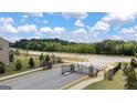 Gated entrance to The Gates at Pates Creek community at 1723 Goodwin, Hampton, GA 30228
