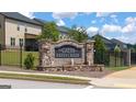 Stone entrance sign for The Gates at Pates Creek community at 1723 Goodwin, Hampton, GA 30228