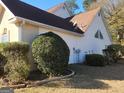 Side view of house showing additional landscaping and exterior features at 98 Gleneagles Dr, Fayetteville, GA 30215