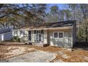 Light beige house exterior with a simple design at 1471 Cedar Creek Ln, Riverdale, GA 30296