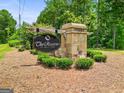 Stone entrance sign for The Reserve at Kelly Lake community at 115 Grace Hope Dr, Brooks, GA 30205