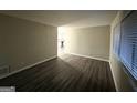 Bright and spacious living room with hardwood floors at 1908 Delowe Sw Pl, Atlanta, GA 30311