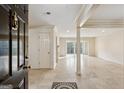 Elegant entryway with tiled floors and views into the living room at 27107 Plantation Ne Dr # 107, Atlanta, GA 30324