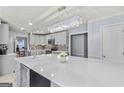 Modern kitchen with white cabinets, quartz countertops, and island at 1799 Birkshire Rdg, Mcdonough, GA 30252