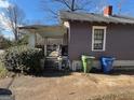 Side view of house showing porch and driveway at 1839 Lakewood Se Ave, Atlanta, GA 30315