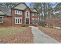 Brick house with a double door entry and walkway at 803 Natchez Ct, Peachtree City, GA 30269
