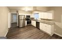Modern kitchen featuring stainless steel appliances and granite countertops at 3029 Mckenzie Rd, East Point, GA 30344