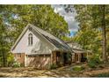 Home with attached garage and large backyard at 183 Madden Rd, Bowdon, GA 30108