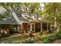 Brick and white sided home with covered porch at 183 Madden Rd, Bowdon, GA 30108