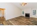 Spacious living room with hardwood floors, fireplace, and vaulted ceiling at 1949 Greensbrooke Close, Stone Mountain, GA 30088