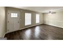 Spacious living area featuring hardwood floors and large windows at 1914 Janet Ln, Decatur, GA 30035