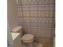 Clean bathroom with shower/tub combo and patterned curtain at 3248 Brisbane Way, Lithonia, GA 30038