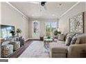 Bright and airy living room with comfortable seating and large window at 5158 Noble Village Way # 35, Lilburn, GA 30047