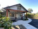 Gray craftsman home with a welcoming front porch at 1838 Moore Nw St, Atlanta, GA 30318