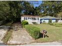 House exterior with driveway and landscaping at 1110 1St Nw St, Atlanta, GA 30318