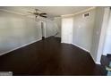 Spacious living room featuring dark hardwood floors at 361 Almon Rd, Covington, GA 30014
