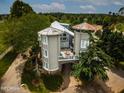 Unique, two-towered house with a connecting structure and surrounding grounds at 460 Dixie Rd, Covington, GA 30014