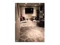 Finished basement with tile floors and fireplace at 4520 Clement Sw Dr, Atlanta, GA 30331