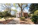 Brick home with lush landscaping and a stately presence at 2204 Monticello St, Covington, GA 30014