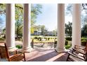 Relaxing porch with rocking chairs overlooking a tranquil neighborhood at 2204 Monticello St, Covington, GA 30014