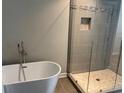 Spa-like bathroom with soaking tub and a large walk-in shower at 2120 Railyard Avenue # 13, Grayson, GA 30017