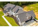 Modern farmhouse with large yard and unique roofline at 604 N Van Wert N Rd, Villa Rica, GA 30180