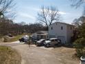 House with two-car garage and large yard at 541 Mary Lou St, Suwanee, GA 30024