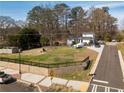 House with boat and large grassy area at 541 Mary Lou St, Suwanee, GA 30024