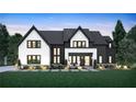 Modern farmhouse exterior, dark and light colors at 2030 Fontainbleau Dr, Conyers, GA 30094