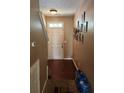 Home entryway with hardwood floors and wall decor at 4216 High Park Ln, Atlanta, GA 30344