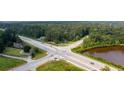 Aerial view of a highway intersection near a pond at 829 Angham Rd, Hiram, GA 30141