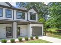 Two-story townhome with attached garage and modern exterior at 1321 Parc Bench Rd, Atlanta, GA 30316