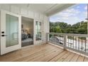 Private deck with view of trees and partial city view at 3667 Peachtree Ne Rd # 13, Atlanta, GA 30319