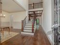 Two-story foyer with hardwood floors and a staircase at 987 Kora Sw Dr, Marietta, GA 30064