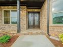 Elegant entryway with double doors and stone flooring at 987 Kora Sw Dr, Marietta, GA 30064