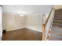 Hardwood floor dining room with neutral walls and ample natural light at 169 Barone Nw Pl, Atlanta, GA 30327
