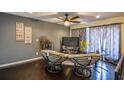 Cozy living room featuring dark hardwood floors and two armchairs at 340 Sir Richard Ct, Jonesboro, GA 30236