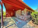 Brick house with covered porch and landscaping at 650 Lyric Nw Way, Atlanta, GA 30318
