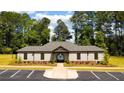Community pool and clubhouse with landscaping at 5680 T. A. Bryant Way, Stonecrest, GA 30038