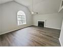 Living room with hardwood floors and fireplace at 5789 Wellborn Creek Dr, Lithonia, GA 30058