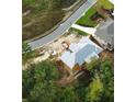 New house under construction with gray roof and wooded setting at 4408 Brookview Se Dr, Atlanta, GA 30339