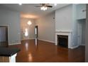 Spacious living room featuring hardwood floors and a fireplace at 2816 Staunton Dr, Duluth, GA 30097
