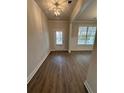 Bright entryway with hardwood floors and neutral paint at 2270 Highridge Point Dr, Lithia Springs, GA 30122