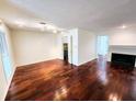 Hardwood floors and access to kitchen and other rooms at 8740 Roswell Rd # 9D, Atlanta, GA 30350