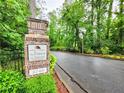 Entrance to The Forest at Huntcliff Condominiums at 8740 Roswell Rd # 9D, Atlanta, GA 30350