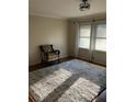 Bright living room featuring hardwood floors and large windows at 1433 Woodland Sw Ter, Atlanta, GA 30311