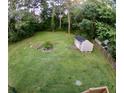 Large backyard with shed and grassy area at 3364 Joseph Nw Dr, Acworth, GA 30101