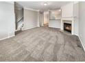 Spacious living room with fireplace and carpeting at 6756 Blackstone Pl # 6, Mableton, GA 30126