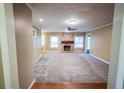 Spacious living room featuring a fireplace and hardwood floors at 470 Houze Way, Roswell, GA 30076