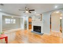 Hardwood floors, fireplace, and open concept to kitchen and dining area at 1902 Canterbury St, Decatur, GA 30032